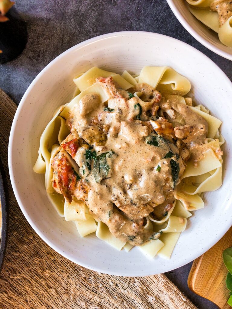 Tuscan Chicken Pasta Bowls - An easy recipe made in under 30 minutes for a creamy, dreamy dinner.