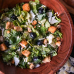 This delicious caesar salad is a hit! The mozzarella cheese and granulated garlic adds the perfect touch to the traditional caesar salad ingredients.