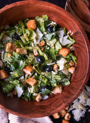 This delicious caesar salad is a hit! The mozzarella cheese and granulated garlic adds the perfect touch to the traditional caesar salad ingredients.