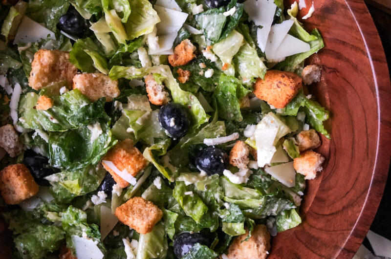 This delicious caesar salad is a hit! The mozzarella cheese and granulated garlic adds the perfect touch to the traditional caesar salad ingredients.