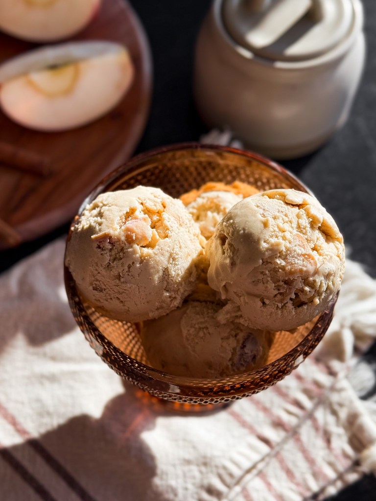 Maple Cinnamon Apple Ice Cream with a sunlight stream hitting it.