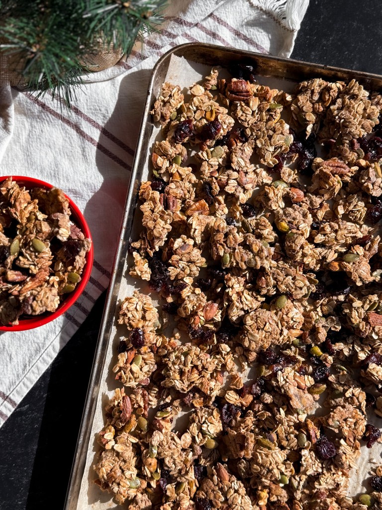A healthy Christmas Granola recipe with pecans and dried cranberries.