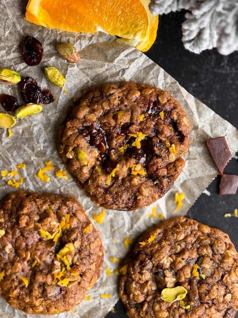 Christmas Oatmeal Cookies with orange zest on top.