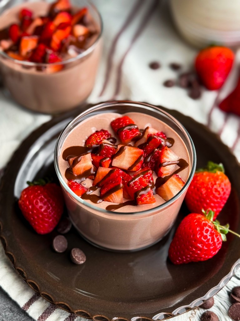 Overhead photo of a healthy, super easy, and high protein Healthy Chocolate Protein Pudding that uses cottage cheese, cacao powder, and maple syrup. Recipe is by Home-Cooked Living, a healthy website that helps women with hormonal imbalances such as PCOS.