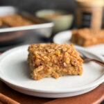 Cover photo for Almond Butter Banana Baked Oatmeal by Home-Cooked Living - a warm, cozy, and delicious breakfast that's perfect for meal-prepping, health fanatics, and those trying to eat more satiating breakfasts.