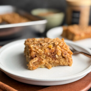 Cover photo for Almond Butter Banana Baked Oatmeal by Home-Cooked Living - a warm, cozy, and delicious breakfast that's perfect for meal-prepping, health fanatics, and those trying to eat more satiating breakfasts.