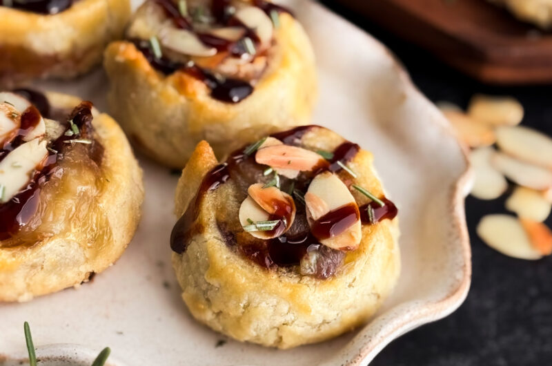 Healthy pastry recipe by home-cooked living. Filled with brie, rosemary, and jam, and topped with toasted almonds and balsamic glaze.
