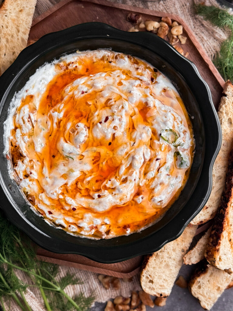 Zesty greek yogurt dip mixed with homemade chili oil - a crunchy, creamy, savory, and slightly spicy appetizer