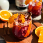 Healthy winter mocktail recipe - a delicious Spiced Cherry Orange Mocktail by Home-Cooked Living that uses real fruit juice.