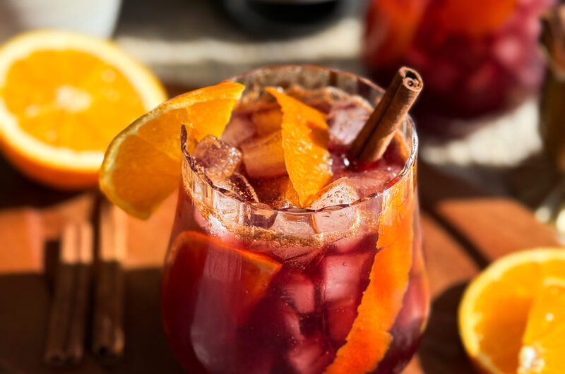 Healthy winter mocktail recipe - a delicious Spiced Cherry Orange Mocktail by Home-Cooked Living that uses real fruit juice.