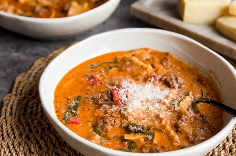 2 bowls of Healthy Lasagna Soup with freshly grated parmesan cheese - an easy and healthy recipe by Home-Cooked Living